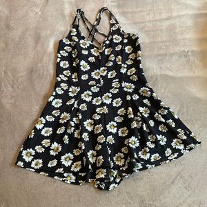 Medium daisy romper with cross cross spaghetti back size medium